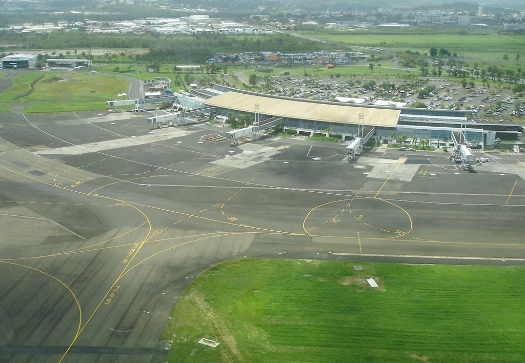 Portrait or photograph of Aime Cesaire: Aéroport International Martinique Aimé Césaire