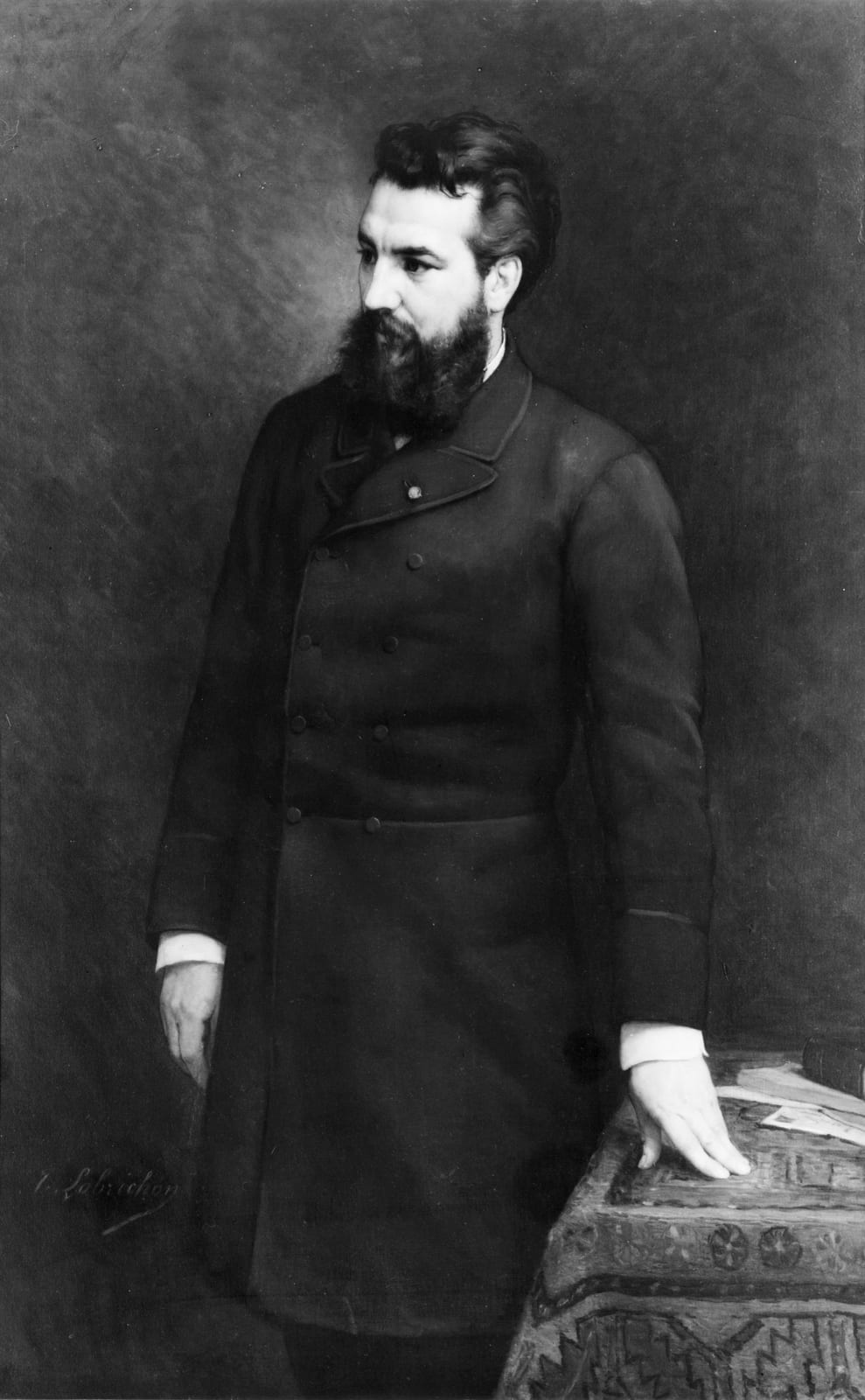 Portrait or photograph of Alexander Graham Bell: Alexander Graham Bell, three-quarter length portrait, standing, facing left