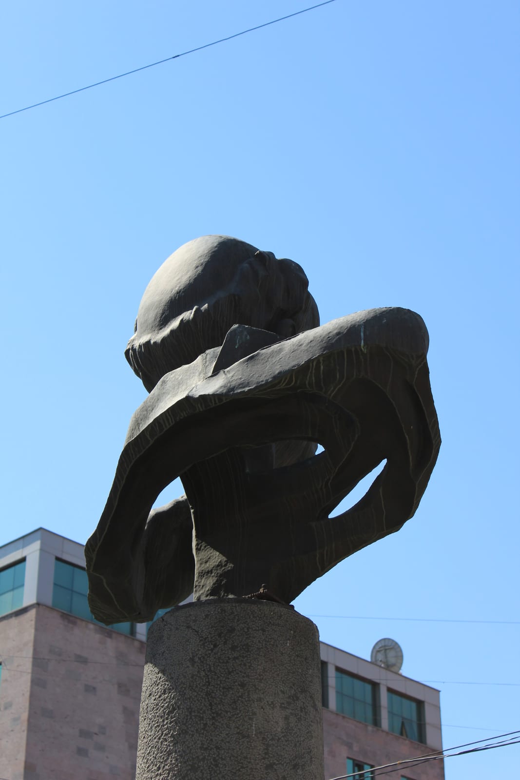 Portrait or photograph of Andrei Sakharov: This is a photo of a monument in Armenia identified by the ID