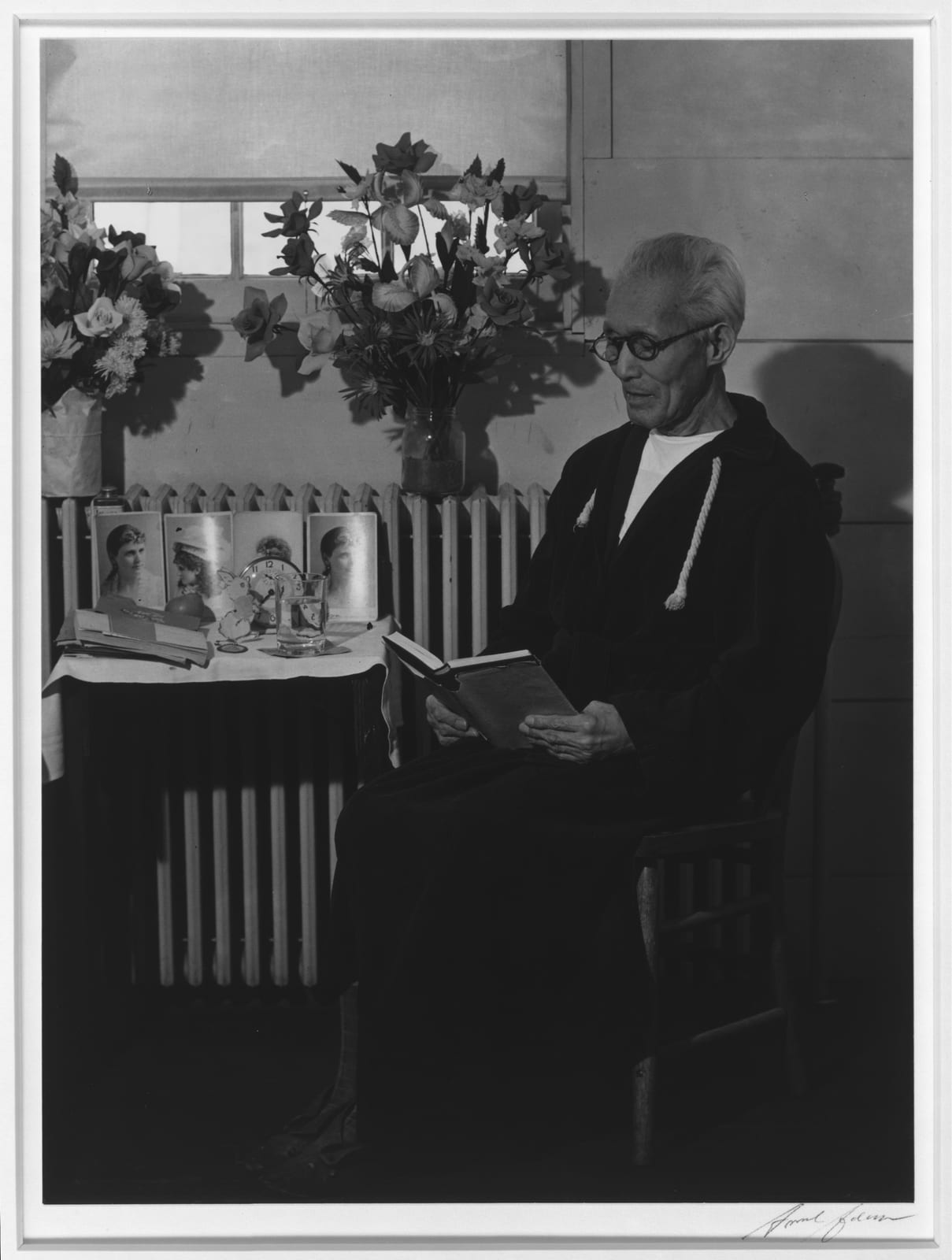 Memorial or place connected to Ansel Adams: Original caption: Harry Sumida, in hospital, Manzanar Relocation Center. Harry Sumida, full-length portrait, seated,
