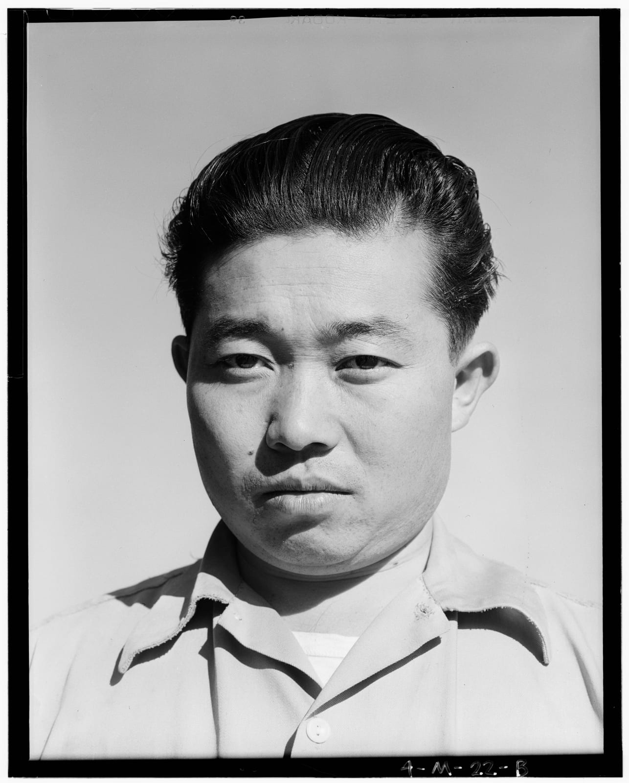 Memorial or place connected to Ansel Adams: Original caption: Benji Iguchi, tractor driver (portrait) Manzanar Relocation Center, California