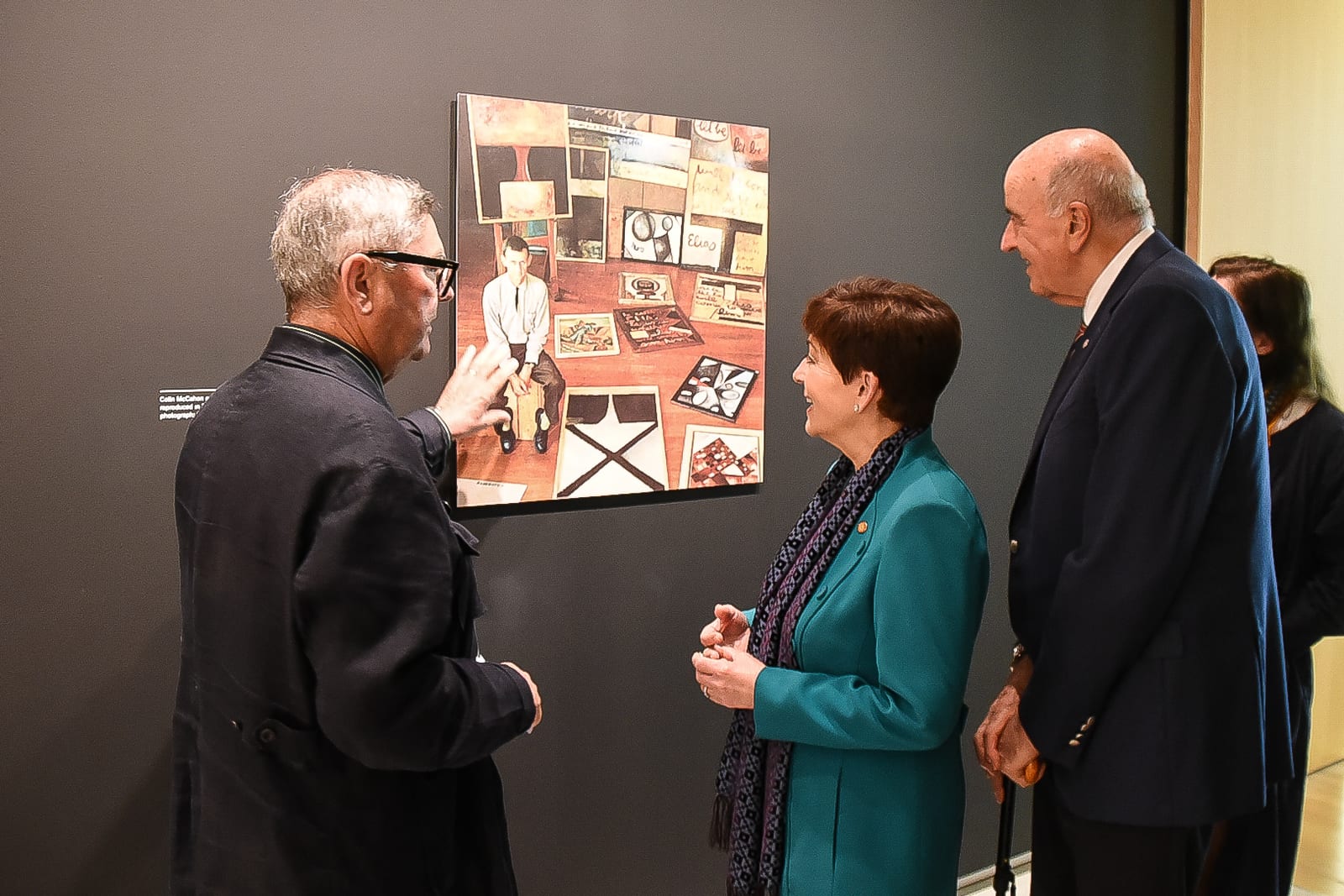 Image connected to Colin McCahon: Ron Brownson (left), senior curator of New Zealand and Pacific art, discussing a photograph of Colin McCahon with the governor