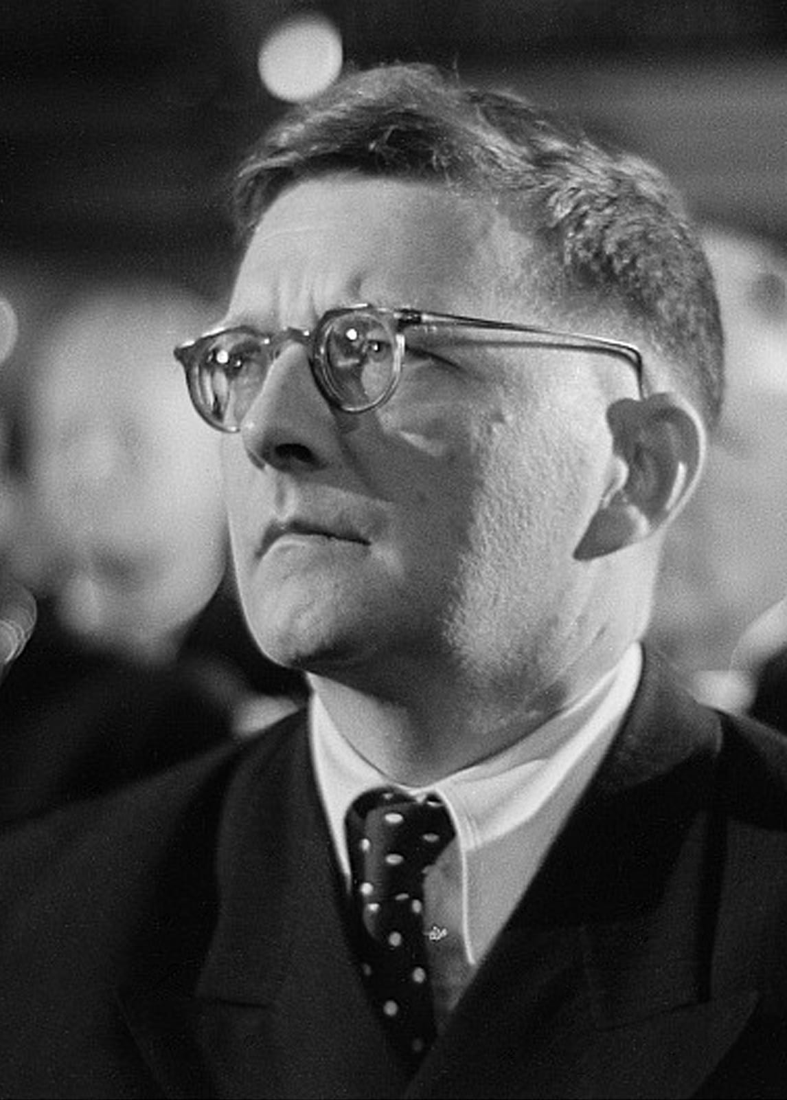 Portrait or photograph of Dmitri Shostakovich: Dmitri Shostakovich's portrait, in the audience at the Bach Celebration of July 28, 1950. Photo by Roger & Re