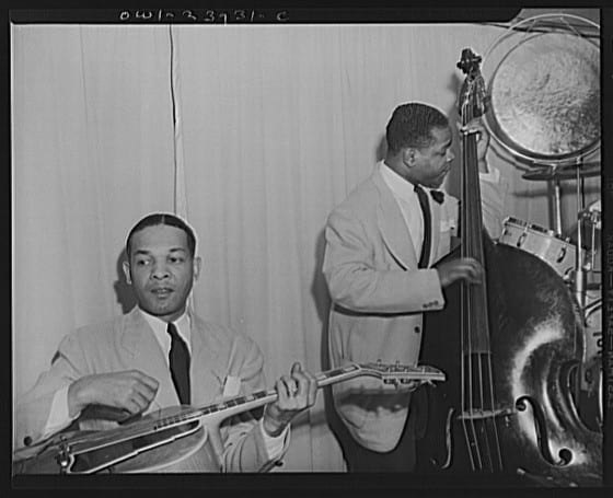Portrait or photograph of Duke Ellington: Two members of Duke Ellington 's rhythm section at the Hurricane Ballroom