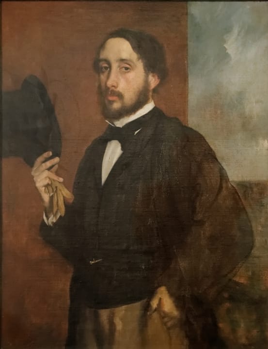Portrait or photograph of Edgar Degas: Autoportrait ou Degas saluant, Edgar Degas vers 1863. Huile sur toile exposée au musée Calouste Gubenkian sous le N°2307