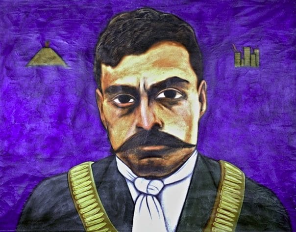 Portrait or photograph of Emiliano Zapata: Banner/ portrait of Emiliano Zapata by Mike Alewitz. 10'x10'. 1995. This banner was painted as part of a 1995 strike