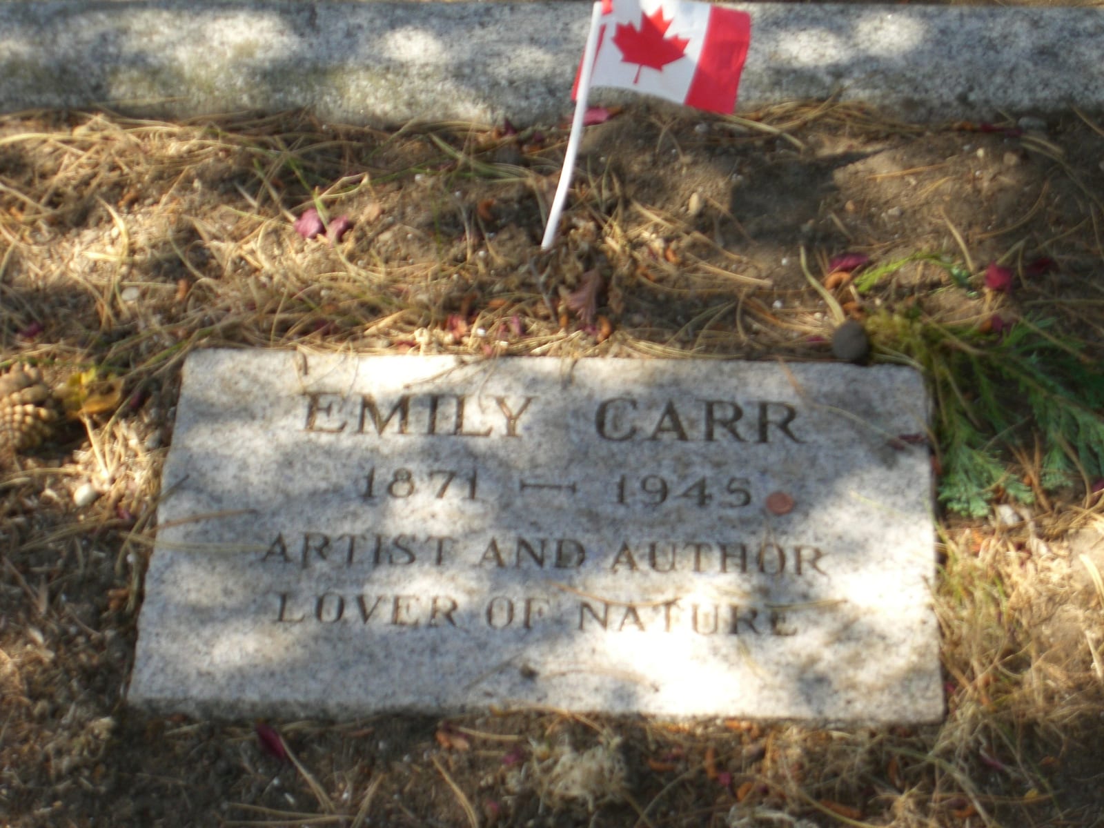Portrait or photograph of Emily Carr: Grave marker of Emily Carr at Ross Bay Cemetery, Victoria BC.