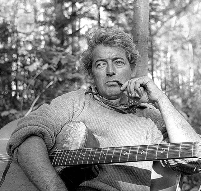 Portrait or photograph of Felix Leclerc: Quebec's singer and poet Felix Leclerc in a image from the "Abitibi" TV program, July 1957