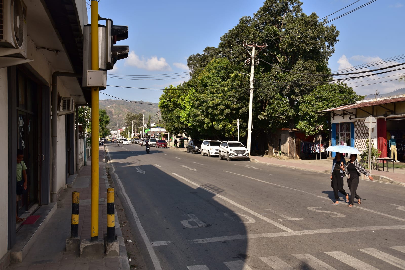 Portrait or photograph of Francisco Xavier do Amaral: View of Avenida 20 de Maio, Dili, East Timor, at its intersection with Avenida Francisco Xavier do Amaral,