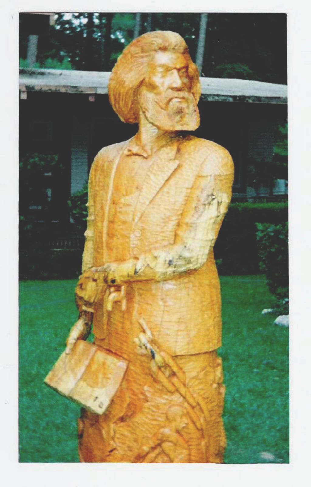 Portrait or photograph of Frederick Douglass: It is a sculpture portrait of Frederick Douglass