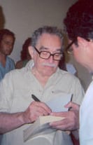 Portrait or photograph of Gabriel Garcia Marquez: edited image of Gabriel Garcia Marquez, signing in Havana, from an image in the public domain