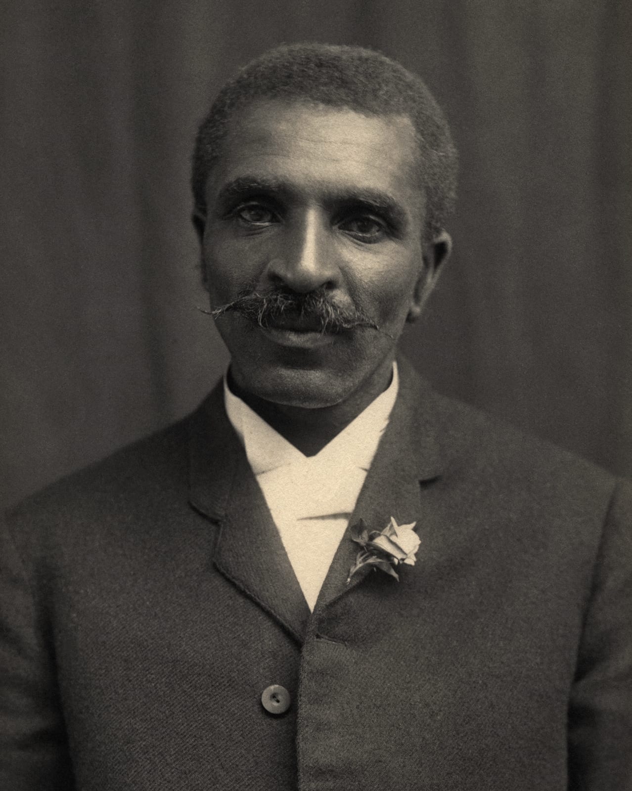 Portrait or photograph of George Washington Carver: Botanist George Washington Carver . The image has been restored, with dust spots removed, and with levels ad