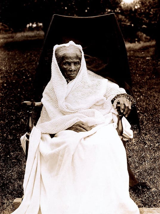 Portrait or photograph of Harriet Tubman: Harriet Tubman , full-length portrait, seated in chair, facing front, probably at her home in Auburn, New York