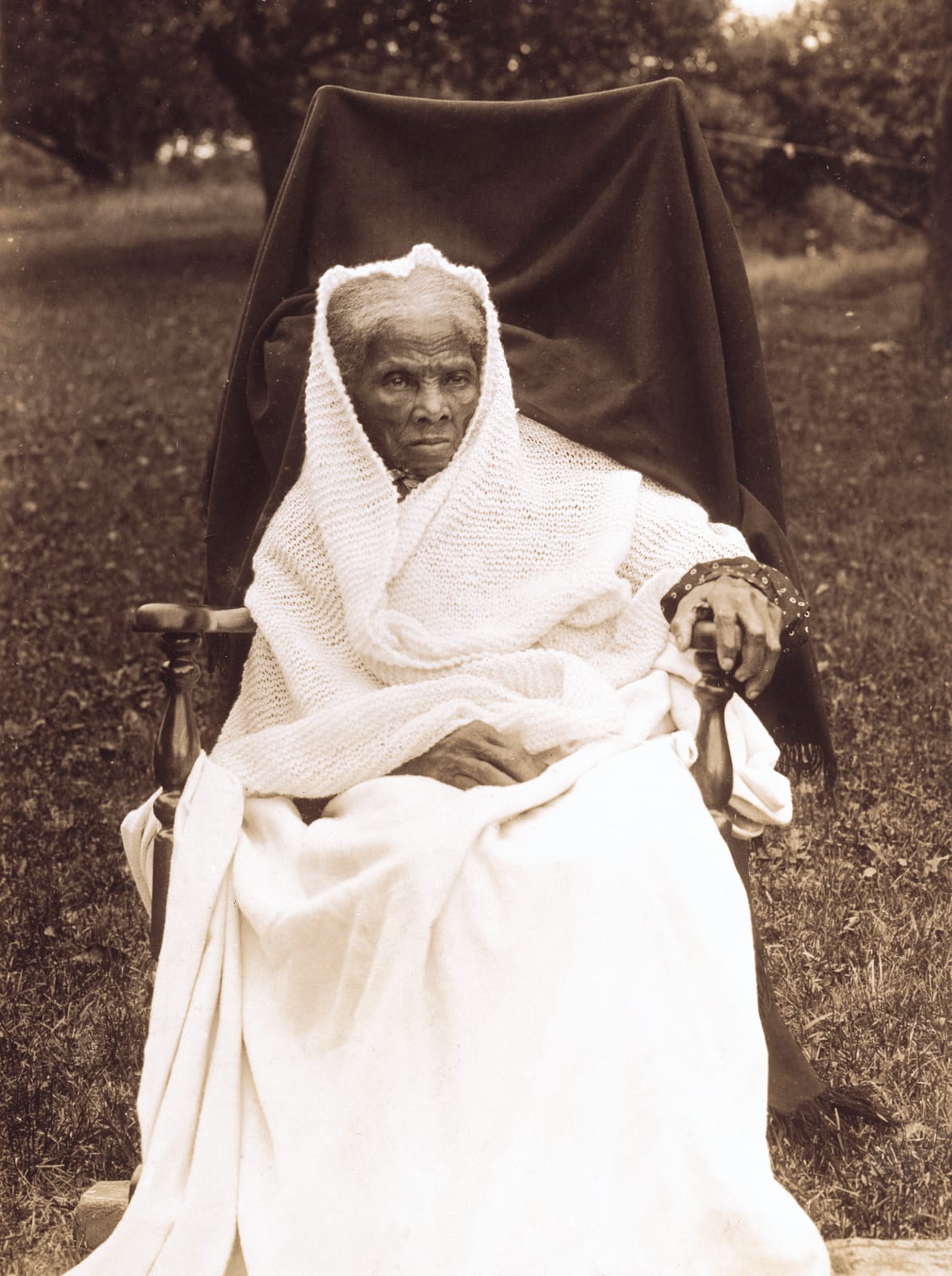 Portrait or photograph of Harriet Tubman: Harriet Tubman , full-length portrait, seated in chair, facing front, probably at her home in Auburn, New YorK