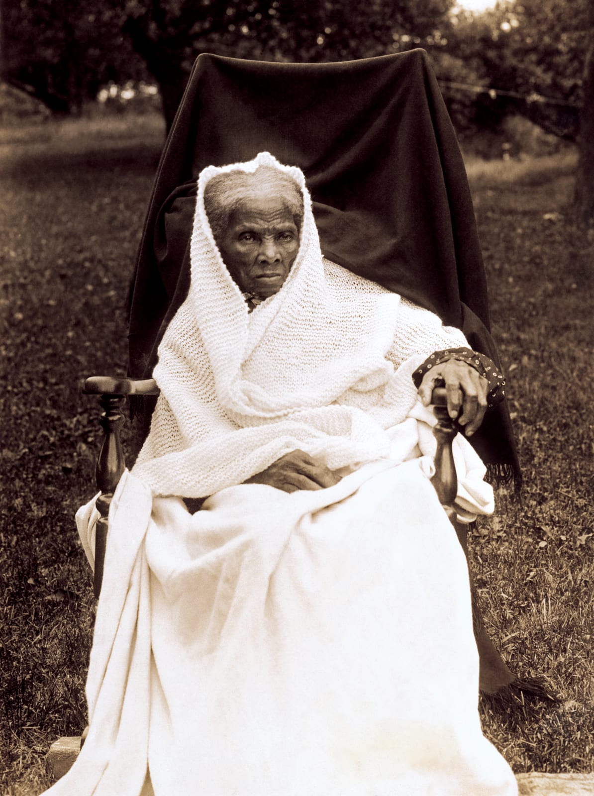Portrait or photograph of Harriet Tubman: Harriet Tubman , full-length portrait, seated in chair, facing front, probably at her home in Auburn, New York