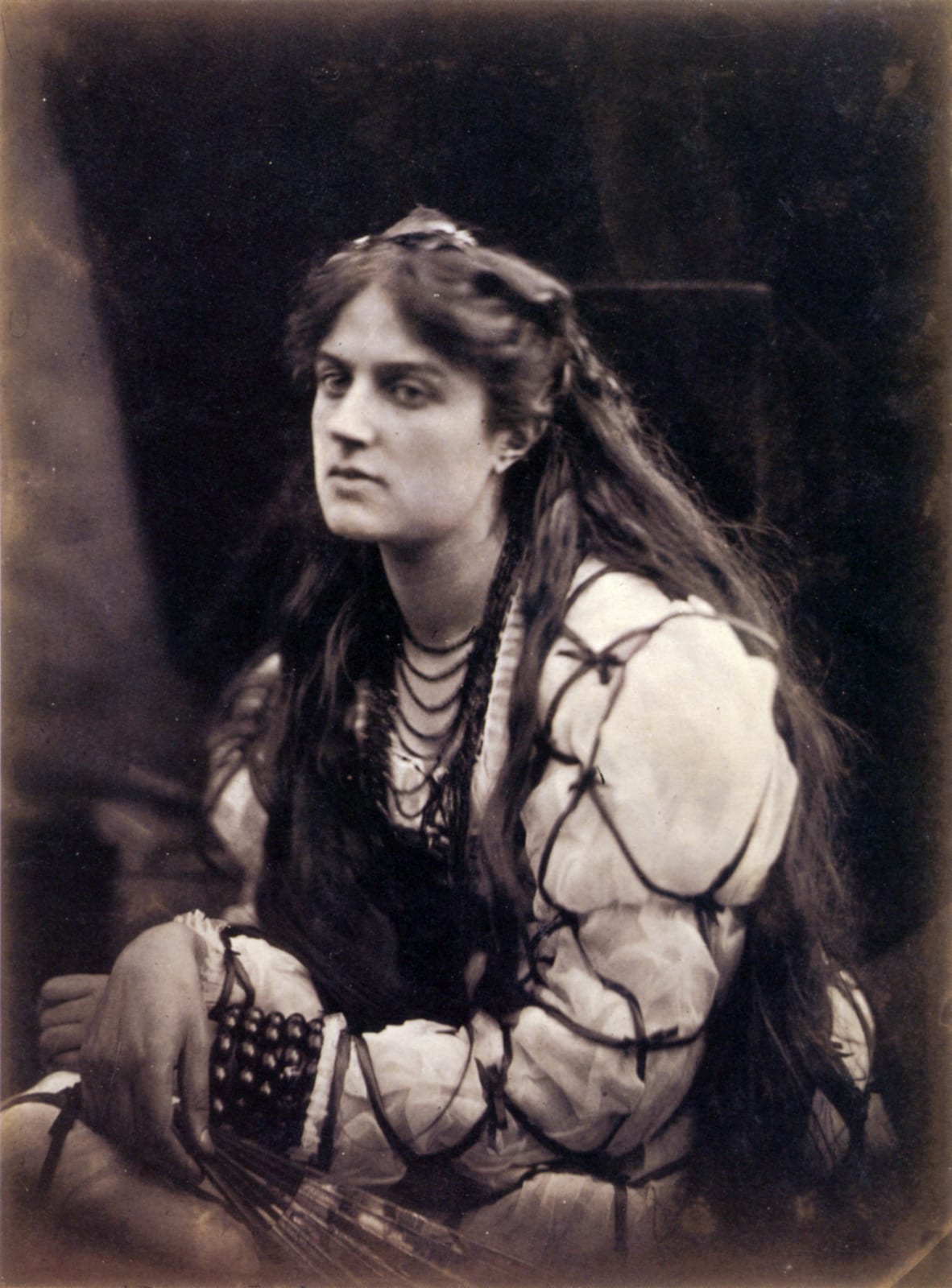 Portrait or photograph of Hypatia: Hypatia. Model is Marie Spartali. Albumen print, 335 x 246mm (13 1/4 x 9 5/8").