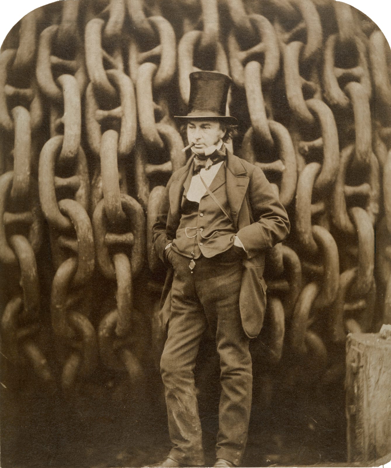 Portrait or photograph of Isambard Kingdom Brunel: Isambard Kingdom Brunel against the launching chains of the Great Eastern at Millwall in 1857, photo by Rober