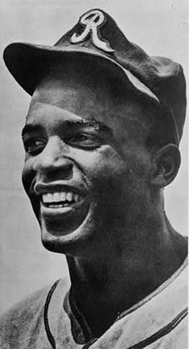 Portrait or photograph of Jackie Robinson: Photo of Jackie Robinson in Kansas City Royals uniform. The Kansas City Royals of the time were the barnstorming team