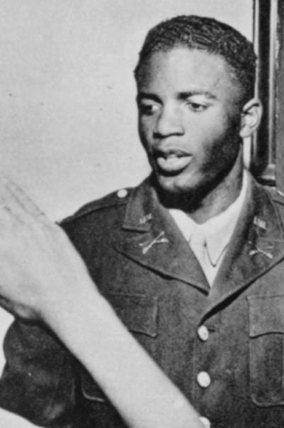 Portrait or photograph of Jackie Robinson: Photo of Jackie Robinson in his military uniform, during a visit to his Pasadena family home, c. 1943. This is a phot