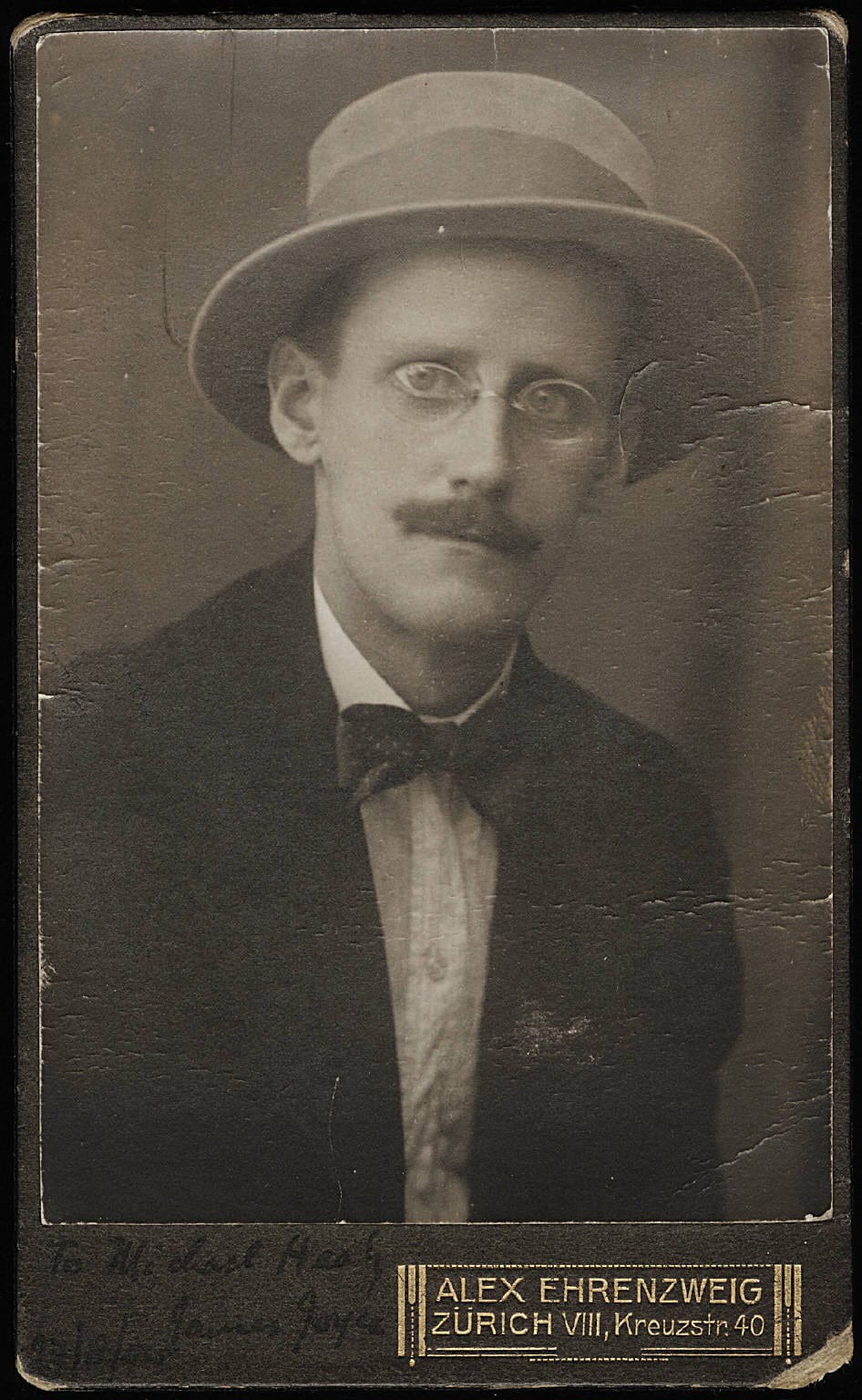 Portrait or photograph of James Joyce: James Joyce, 1 photographic print, b&w, cartes-de-visites, 9.2 x 6.1 on mount 10.5 x 6.5 cm.