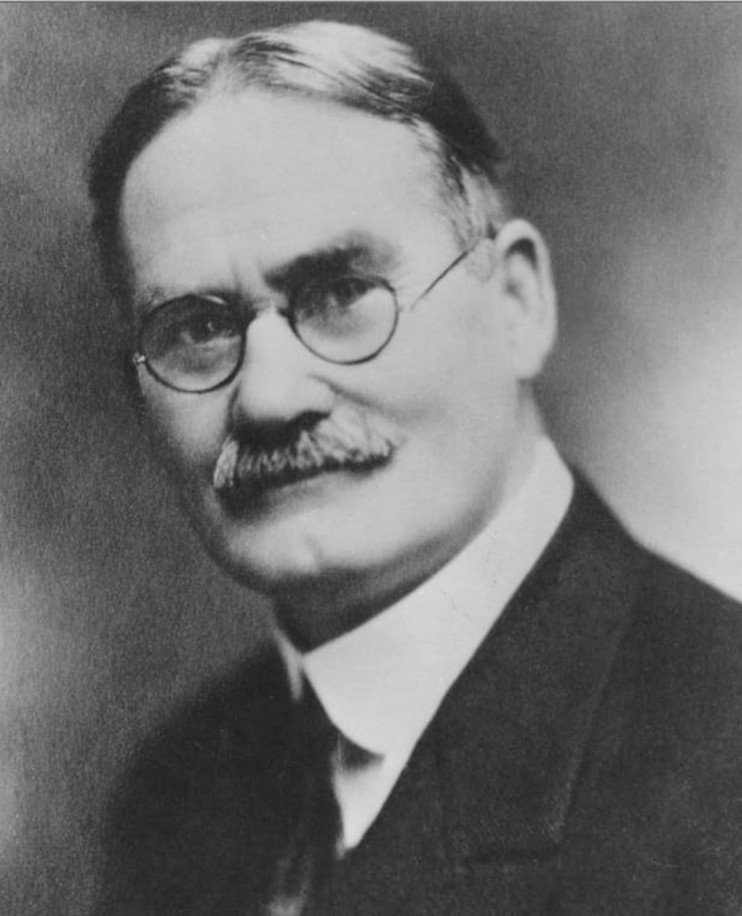 Portrait or photograph of James Naismith: This is a portrait photograph of Dr. James Naismith taken around 1920 by Springfield College.