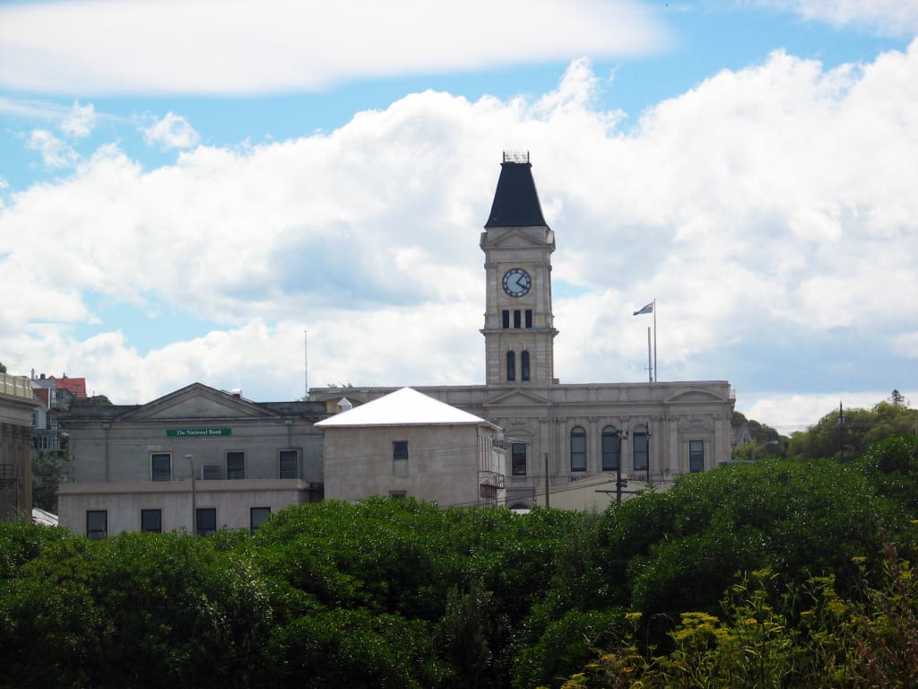 Image connected to Janet Frame: Clock in Oamaru, New Zealand, often described by Janet Frame. It is part of the former Oamaru Post Office, now the Waitaki Distr