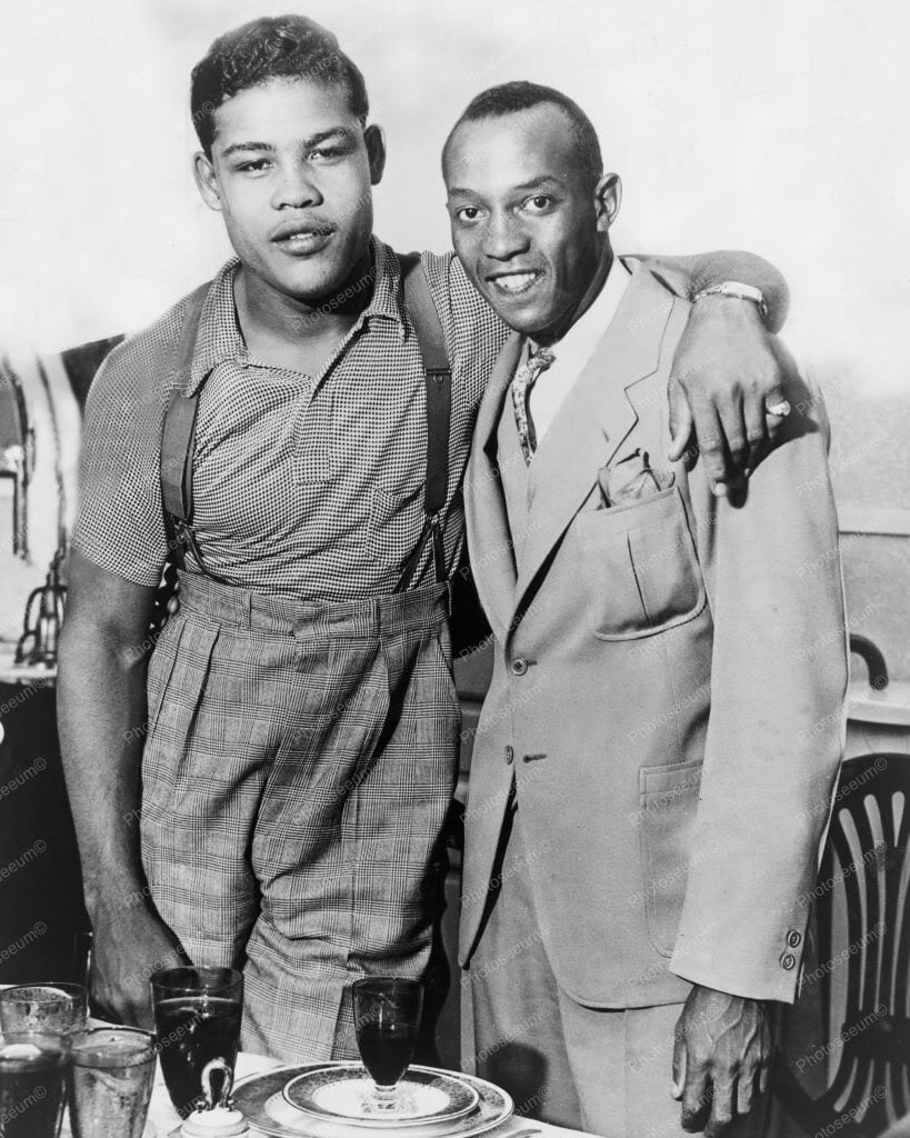 Portrait or photograph of Jesse Owens: JOE LOUIS (left), newest sensation of the prize ring, and Jesse Owens, whose marvelous feats on the track and field won w