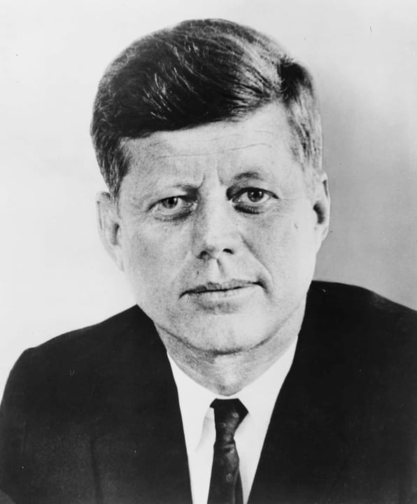 Portrait or photograph of John F. Kennedy: John F. Kennedy , former President of the United States. Slightly modified from original (right eye darkened to match