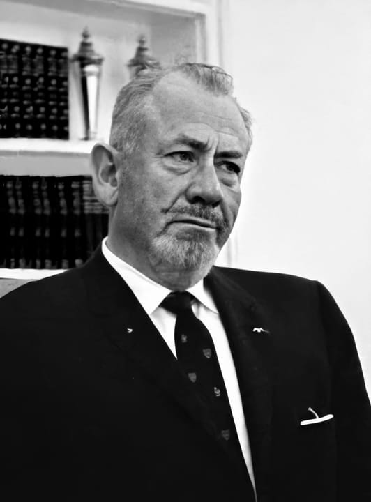 Portrait or photograph of John Steinbeck: John Steinbeck visits LBJ at the oval office in the White House. In the original photo, to his left is Jon Steinbeck,