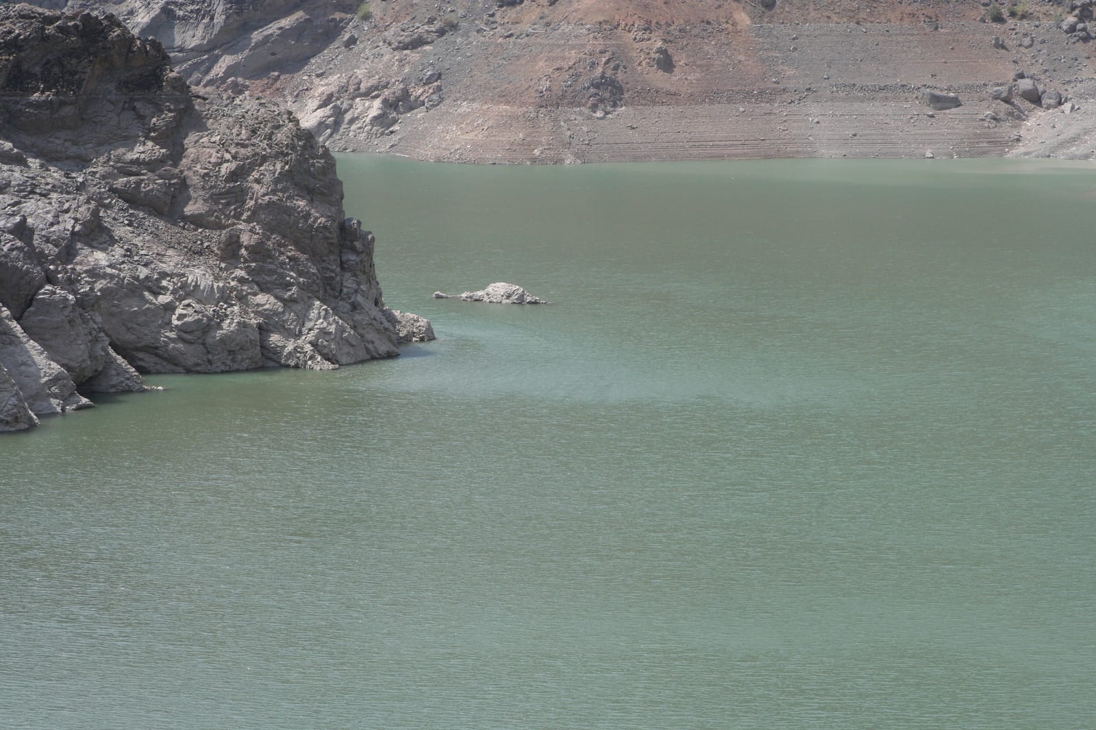 Portrait or photograph of Kabir: Amir Kabir Dam Reservoir