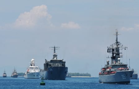 Portrait or photograph of Ki Hajar Dewantara: Indonesian and foreign naval ships during sailing pass rehearsals for 2012 Sail Morotai. From front to back: KRI A