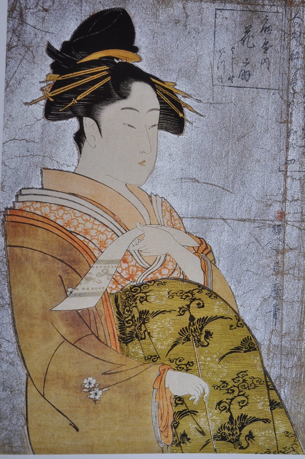 Work or historical image connected to Kitagawa Utamaro: Oiran Hanaogi, by Utamaro (ca. 1794). Woodcut print has a mica background.
