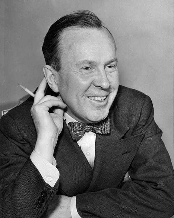 Portrait or photograph of Lester B. Pearson: Lester B. Pearson with a pencil