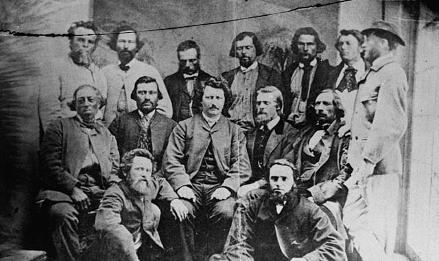 Portrait or photograph of Louis Riel: Councillors of the Provisional Government of the Métis Nation. Front row, L-R: Robert O'Lone, Paul Proulx. Centre row, L-R