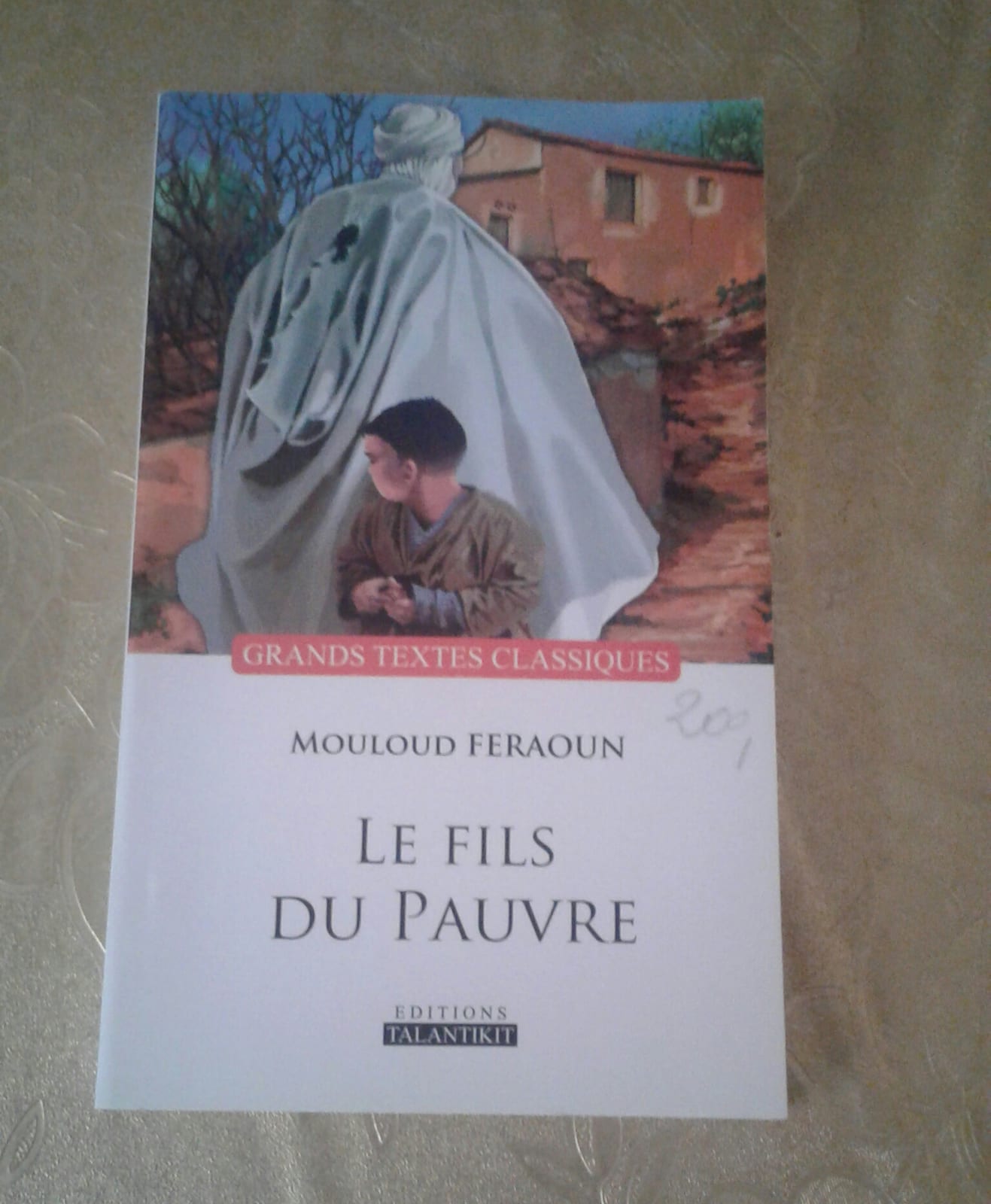 Portrait or photograph of Mouloud Feraoun: est un livre autobiographique de l' écrivain MOULOUD FERAOUN ou il raconte la société kabyle
