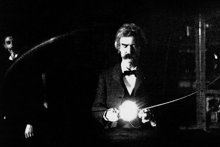 Portrait or photograph of Nikola Tesla: Mark Twain ( penname of Samuel Langhorne Clemens) in the lab of Nikola Tesla, spring of 1894. Clemens is holding Tesla's