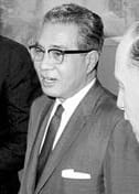Portrait or photograph of Norodom Sihanouk: President John F. Kennedy gestures toward a small statue presented by Prince Norodom Sihanouk of Cambodia in the Pre