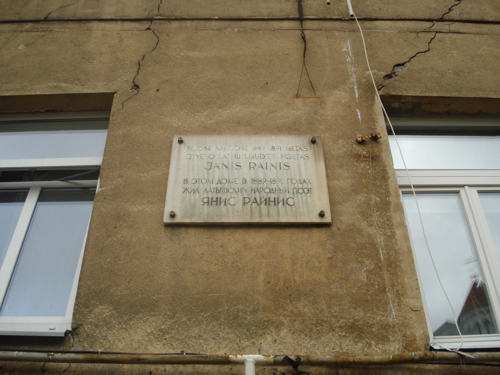 Portrait or photograph of Rainis: Tablet in memory of Latvian poet Janis Rainis who lived in this house in 1889-1891 (Maironio 15)