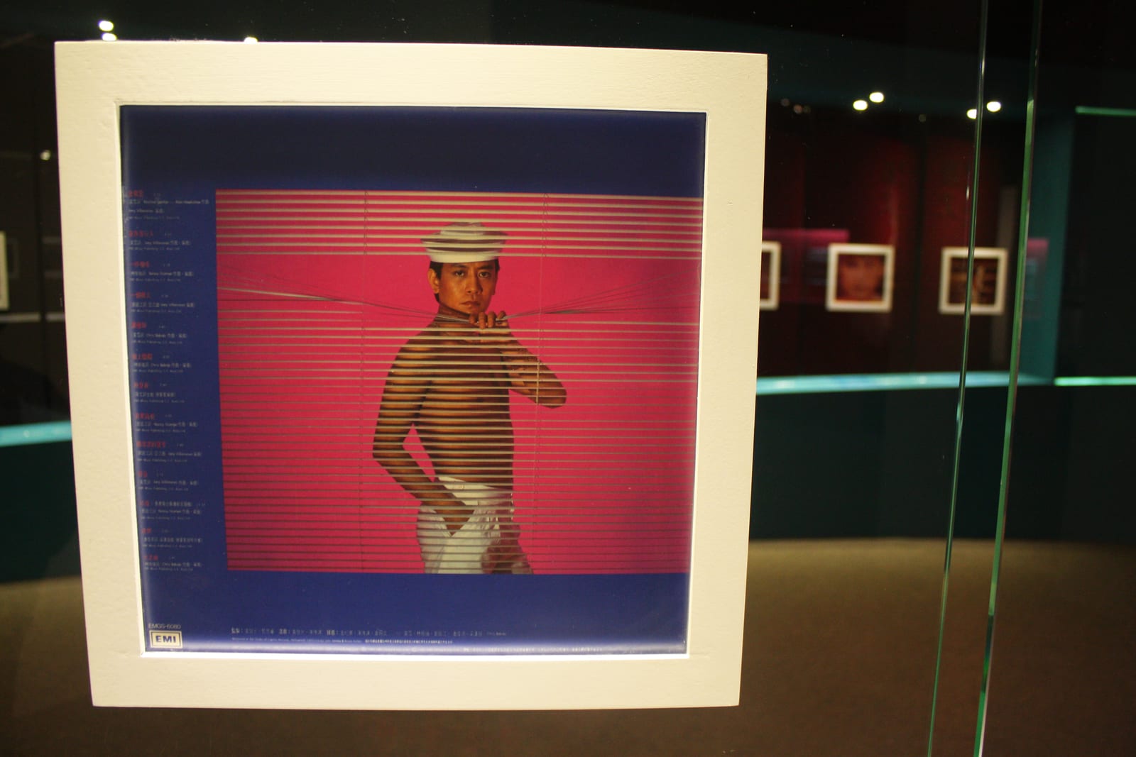 Portrait or photograph of Roman Tam: Roman Tam album on display at the Hong Kong Heritage Museum's exhibit: Applauding to Hong Kong Pop Legend: Roman Tam