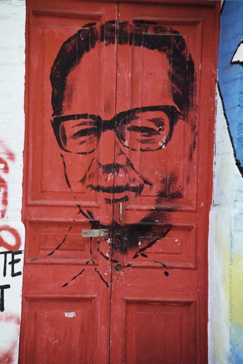 Portrait or photograph of Salvador Allende: Portrait of Salvador Allende, painted on a door in Valparaiso — Chile