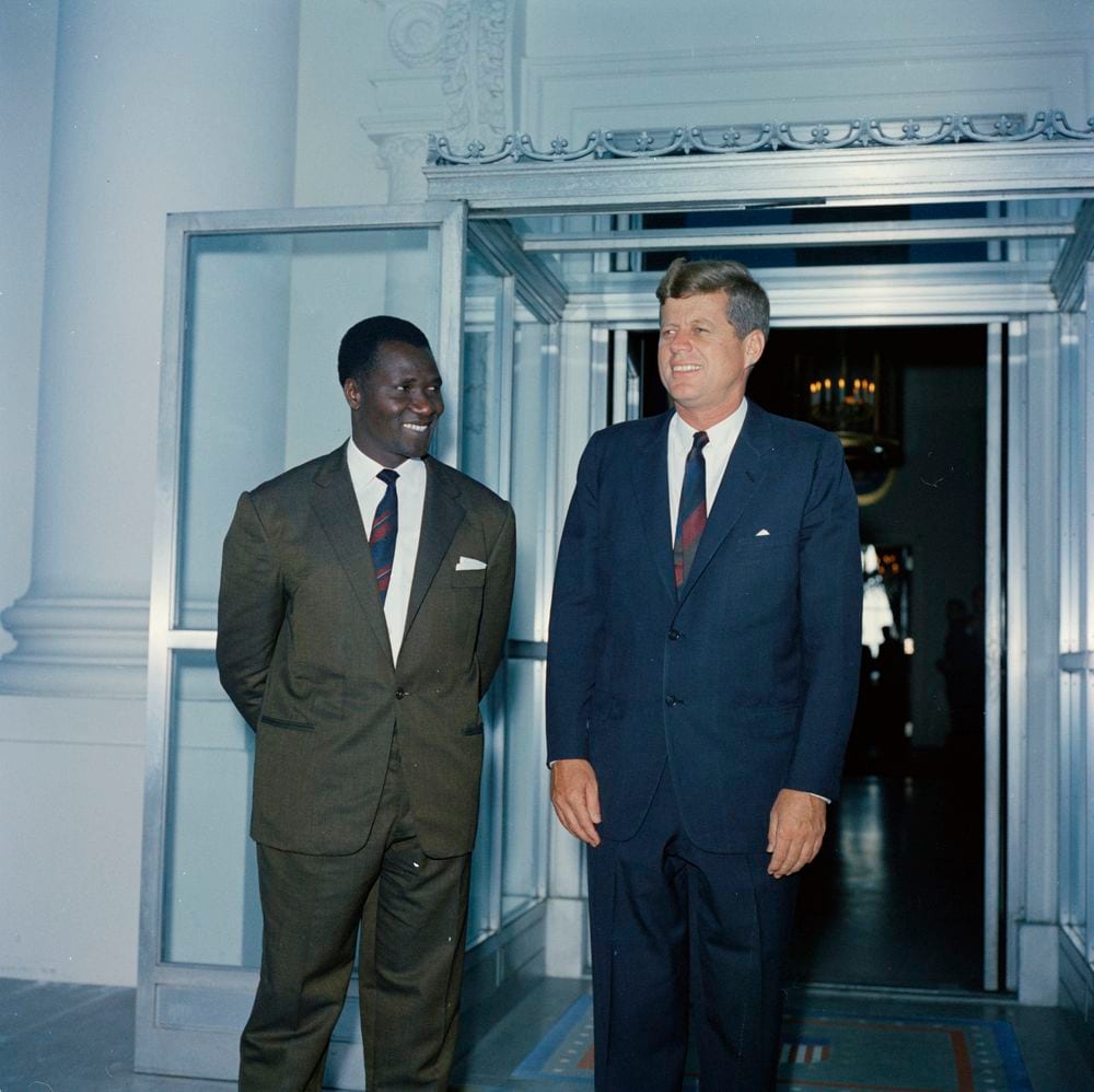 Image connected to Sekou Toure: President John F. Kennedy stands with President of Guinea, Ahmed Sékou Touré (left), at the North Portico of the White House, Wa
