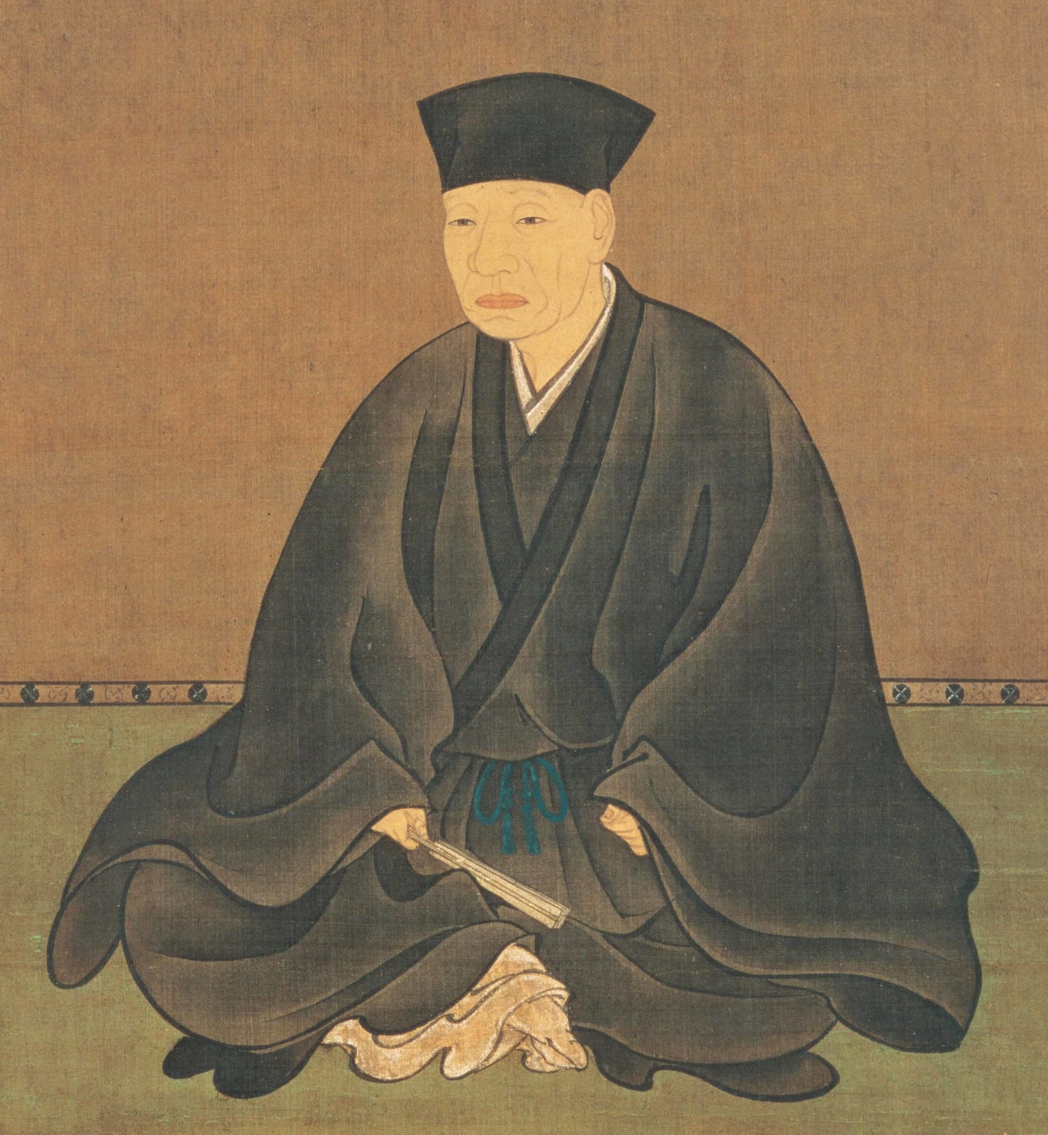 Portrait or photograph of Sen no Rikyu: a portrait by Tōhaku Hasegawa ( 長谷川等伯 )(born in 1539 and dead in 1610), calligraphy by Shunoku Sōen (春屋 宗園)(born in 1529
