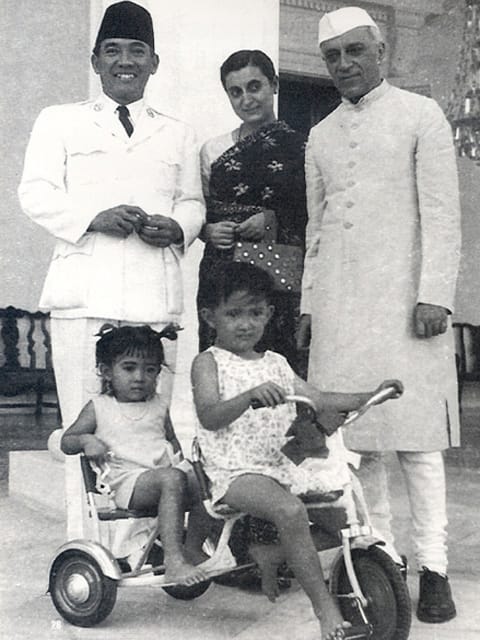 Portrait or photograph of Sukarno: Indonesian President Sukarno with son Guntur Sukarnoputra and daughter Megawati Sukarnoputri while receiving Indian Prime Min