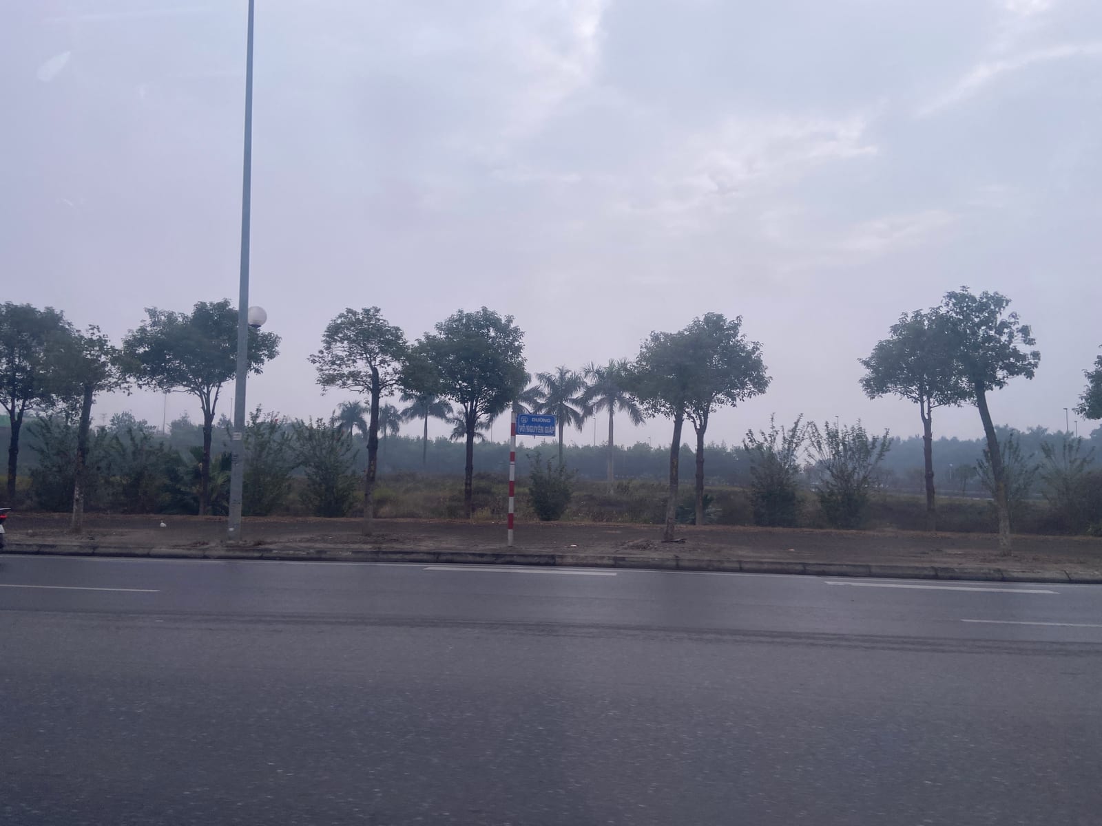 Portrait or photograph of Võ Nguyên Giáp: Võ Nguyên Giáp Road, Hanoi