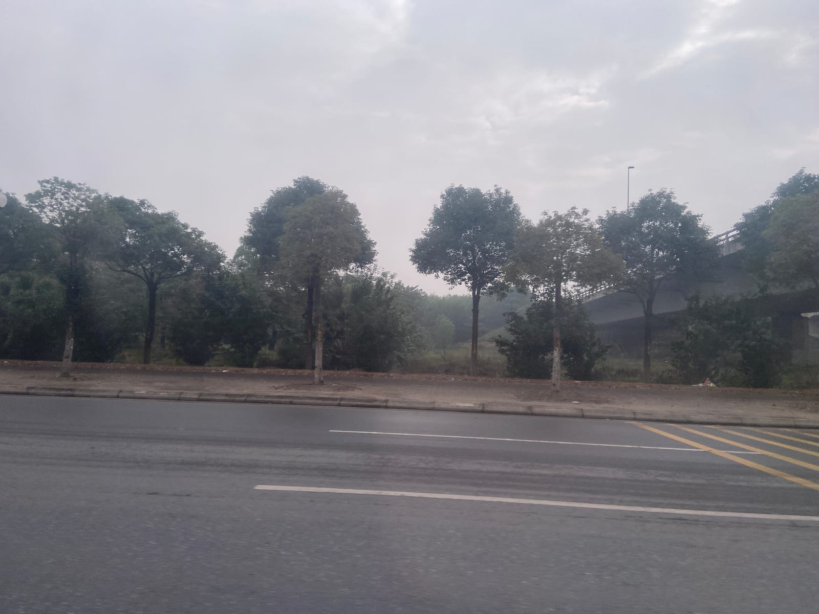 Portrait or photograph of Võ Nguyên Giáp: Võ Nguyên Giáp Road, Hanoi