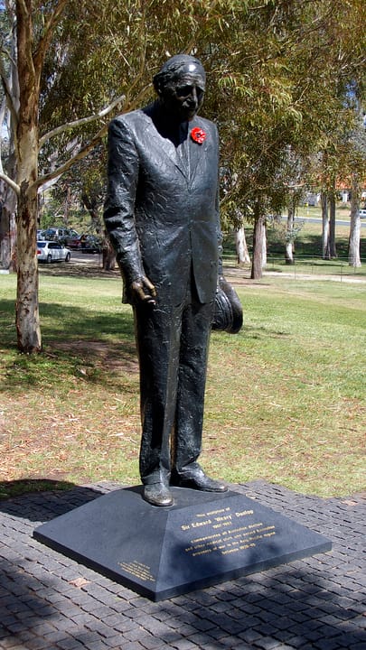 Portrait or photograph of Weary Dunlop: Statue of Sir Edward "Weary" Dunlop on the grounds of the Australian War Memorial which is the molding of File:Edward Du