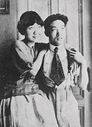 Portrait or photograph of Xu Beihong: Xu Beihong and Jiang Biwei . with a painting given to them by Sanyu. Photo may be from the 1920s