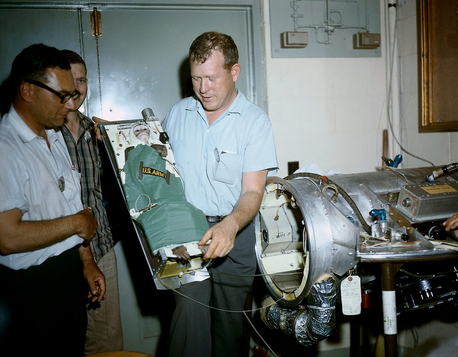 Photograph or image of Able: A squirrel monkey, Able, is being ready for placement into a capsule for a preflight test of Jupiter, AM-18 mission. AM-18 was laun