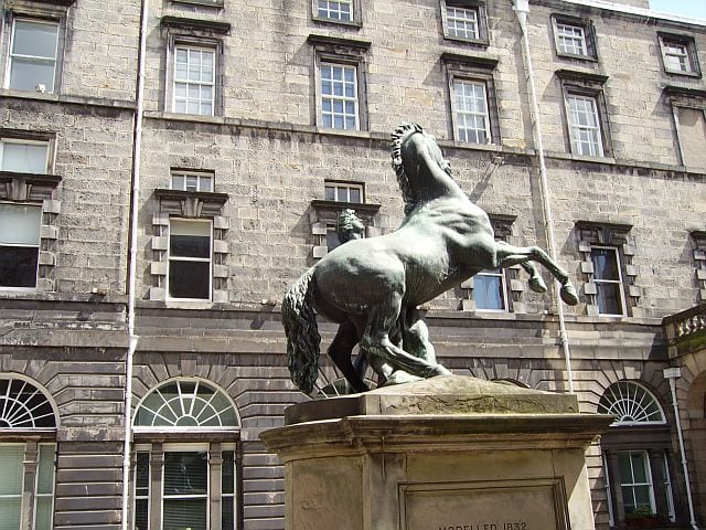 Photograph or image of Bucephalus: Alexander and Bucephalus. Alexander getting the better of his horse. A statue in front of Edinburgh's City Chambers.
