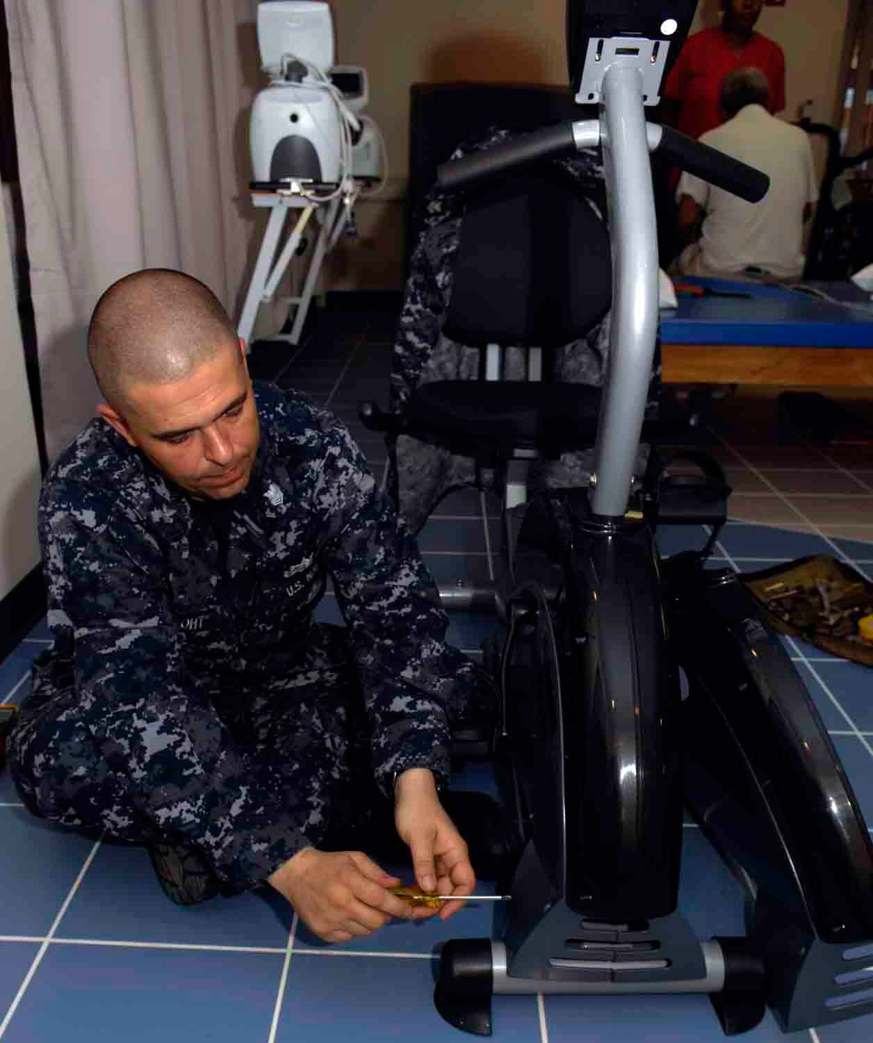 Photograph or image of Chips: ST JOHNS, Antigua (May 6, 2009) Hospital Corpsman 1st Class Anthony Foht, a biological medical repair technician embarked aboard t